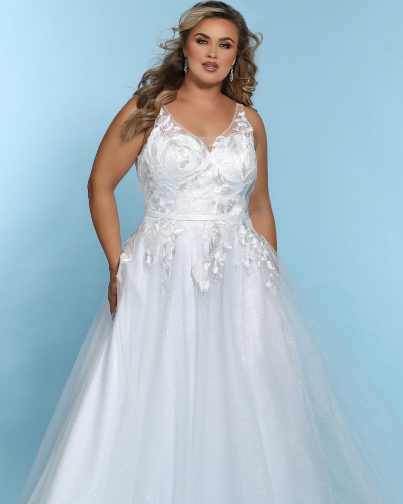 Front of a model wearing a size 26 Celine Bridal Gown in Ivory by Sydney's Closet. | dia_product_style_image_id:285796